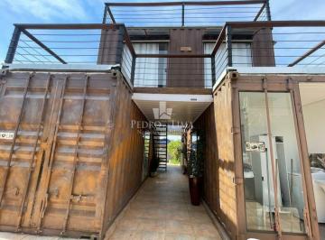 Casa · 168m² · 6 Quartos · 3 Vagas · Casa Container com 6 suítes individuais, cozinha gourmet e piscina na Morada da Praia