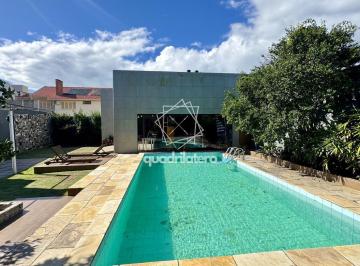 Casa · 386m² · 4 Quartos · 4 Vagas · Sobrado de Alto Padrão no Laranjal – 386m², 4 Dormitórios, Suíte Master com Vista para a Lagoa, Pisc
