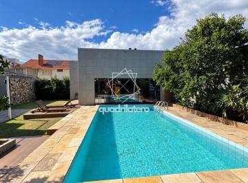 Casa · 386m² · 4 Quartos · 4 Vagas · Sobrado de Alto Padrão no Laranjal – 386m², 4 Dormitórios, Suíte Master com Vista para a Lagoa, Pisc