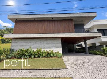 Foto 01 · Casa de alto padrão em condomínio à venda em Joinville-SC, bairro Vila Nova: 3 quartos, 3 suítes, 3