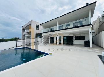 Vista da casa pelos fundos · Moderna casa sobrado à venda no condomínio Delle Stelle em Louveira/SP.