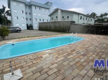 Foto 01 · Apartamento em Ubatuba. Itaguá. 2 quartos. Condomínio com piscina. Oportunidade.