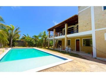 Casa · 220m² · 4 Quartos · 7 Vagas · Casa na Praia de Tabatinga: Seu Paraíso Particular!