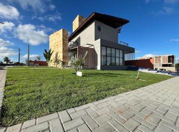 0eea26144f0362421d62d7e4b54cc6c63292ba93 · Casa com 4 dormitórios à venda, 181 m² por R$ 980.000,00 - Carapibus - Conde/PB