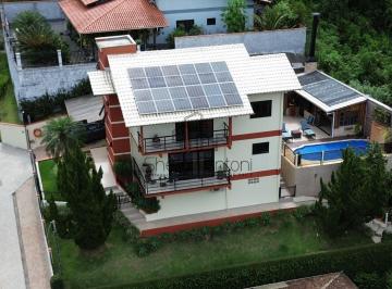 Casa · 290m² · 3 Quartos · 4 Vagas · Residência de Alto Padrão com Infraestrutura Completa e Eficiência Energética