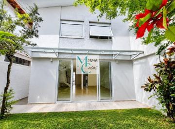 stdlgaq2yte2mgzlyzaxotg5_md · Casa à venda em Moema com quintal gramado, 3 quartos, suíte ampla e 2 vagas