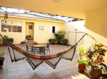 6ff8uac2otgzywuynzlkyzlj_md · Casa à venda no Campo Belo com quintal, edícula e 3 dormitórios