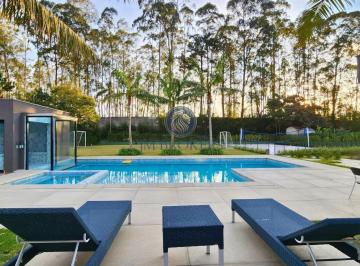 haras guancan - piscina e área externa · Casa de luxo à venda no condomínio Haras Guancan, Granja Viana, 5 suítes, 10 vagas e 940m² de área.