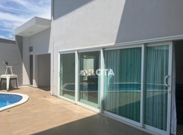 e0491320b8e25edf04f49545961367fe34716475 · Sobrado com 4 suítes com piscina e escritório.