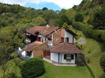 Foto 01 · RA Amil Vende Casa mobiliada, 4 suítes, sendo a suíte máster com hidro, 849m², Capivari, Campos de J
