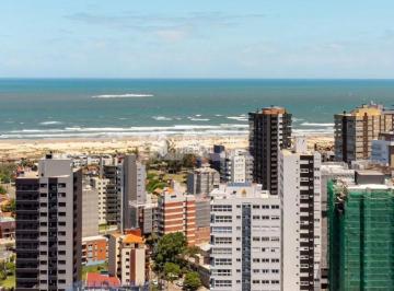 Apartamento · 100m² · 3 Quartos · 2 Vagas · Apartamento de Luxo em Torres: 3 Dormitórios com Vista para o Mar, Rio e Serra