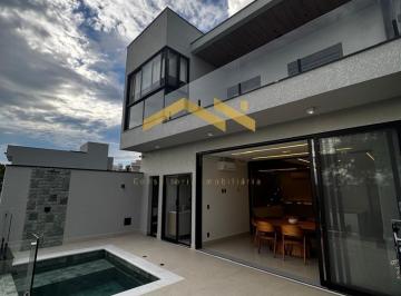 Foto 01 · Casa térrea com 3 suítes, área gourmet acabamento diferenciado, cozinha americana, lavanderia  no Lo
