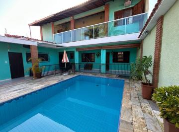 Casa de 4 quartos, Itanhaém · Casa na praia com piscina e 4 quartos em Itanhaém.
