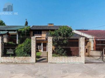 Casa · 230m² · 3 Quartos · 3 Vagas · Residência no bairro Camaquã, com 3 dormitório(s), e 3 banheiros,
