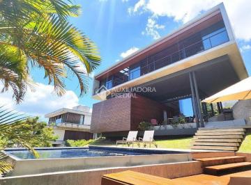 Casa · 319m² · 3 Quartos · 3 Vagas · Casa Vogue Cacupé - Arquitetura autoral com padrão internacional à venda em Florianópolis.