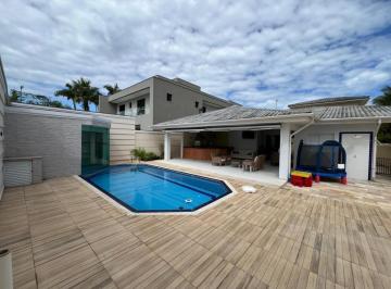 Sobrado alto padrão, 4 quartos, piscina, churrasqueira, cozinha americana, sauna, 4 vagas,  frente praça, excelente acabamento 525m², Loteamento Jardim Acapulco, Guarujá/SP - Foto [1] · Sobrado alto padrão, 4 quartos, piscina, churrasqueira, cozinha americana, sauna, 4 vagas,  frente p