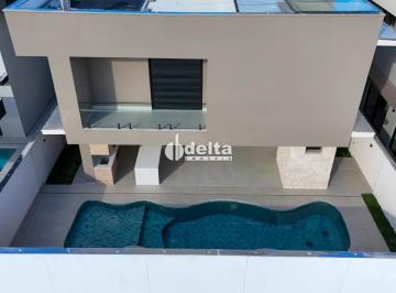Casa · 420m² · 5 Quartos · 5 Vagas · Casa em condomínio com 5 suítes disponível para venda no bairro Jardim Sul em Uberlândia-MG