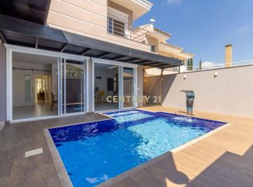 56887fac7c6af7f85f32b3d40aee6f1fe60221e2 · Casa em Codomínio com 3 suítes e piscina