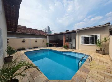 df0379f01b9241fbd708800cecc21f5510c07eb6 · Casa com 3 dormitórios à venda, 145 m² por R$ 980.000,00 - Vila Caiçara - Praia Grande/SP