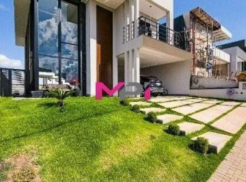 Foto 01 · casa á venda com 242 metros 03 suítes piscina o condomínio Bella Vitta avalia permuta por imóvel