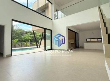 acc89da7959dc21027bab798da590973320f3548 · Casa Nova 399m² com Vista para Mata | Alphaville Nova Esplanada II | Pé-Direito Duplo