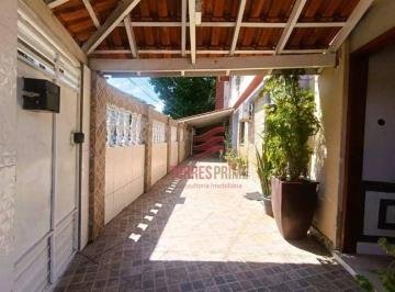 e62967cd64c4da5d107c25ed5cc6e9e5b21f00c2 · Casa com 3 dormitórios à venda, 114 m² por R$ 890.000,00 - Encruzilhada - Santos/SP