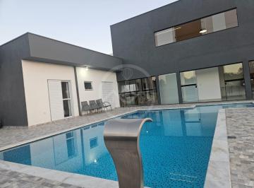 Photo_2 · 
                Casa com 4 dormitórios à venda, 320m² por R$ 1.490.000,00 – Condomínio Portal dos L
