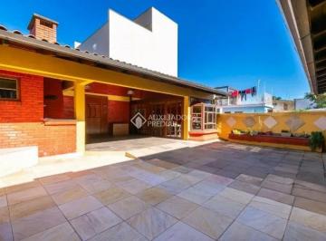 Casa · 280m² · 5 Quartos · 3 Vagas · Casa com 5 quartos 2 suites  próximo a PUC no bairro Partenon em Porto Alegre.