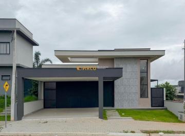 revhlaa2owe4odfkzdbmmjc1_md · Casa Térrea Moderna com 3 Suítes | Pé Direito Duplo | Condomínio Aruanã