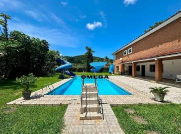 deaa75f11a0ed485135f75006c544dda4514fdc4 · Casa à venda pertinho da Praia do Guaiuba no Guarujá | Omega Imóveis