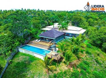 Foto 01 · Casa de luxo à venda na Linha Verde, Jandaíra-BA: 5 suítes, 584 m², piscina com borda infinita, área