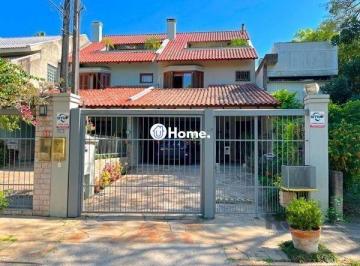 .jpg+2025-03-04 · Casa em Porto Alegre, no bairro Ipanema, com 3 dormitório(s), e 3 banheiros, à v