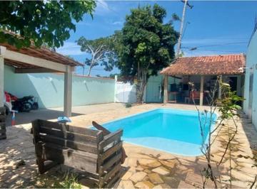 Casa · 108m² · 3 Quartos · À venda casa com piscina, área gourmet e kitnet independente em amplo terreno no bairro Caravelas em