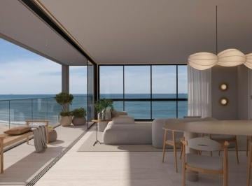 Living integrado à varanda, com o mar ao fundo (imagem ilustrativa) · Apartamento diferenciado 3 quartos 149,75m² Praia Brava Itajaí