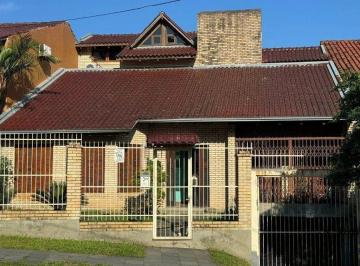 Casa · 372m² · 4 Quartos · 2 Vagas · Casa com 4 dormitórios no bairro Nonoai em Porto Alegre para Alugar