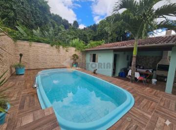 cc697753c70874018d760b7a52de3ad229d6344d · Casa com 3 dormitórios à venda, 129 m² por R$ 600.000,00 - Golfinho - Caraguatatuba/SP