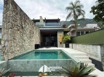 Casa · 240m² · 4 Quartos · 2 Vagas · Casa de Condomínio com 4 suítes pé na areia