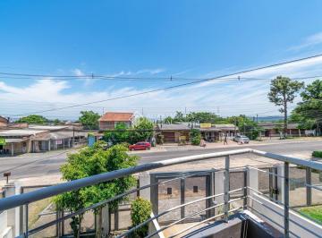 Casa · 100m² · 3 Quartos · 2 Vagas · casa 3 dormitórios 1 suíte com sacada  com vista para Guaíba