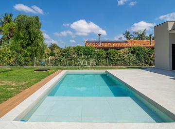 Foto 01 · Casa térrea à venda no Condomínio Campos de Santo Antônio I com 275m² e 4 suítes