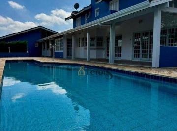 c8a7a1c092be9fe0c24c9f79acb8a43c312bd59b · Casa com 7 dormitórios à venda, 425 m² por R$ 3.500.000,00 - Condomínio Portal Bandeirantes - Porto