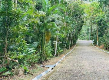 47f5d38125e06f3b611b7c365d43295bda543057 · Lote de terreno duplo à venda no Condomínio Península na Praia da Enseada no Guarujá.
