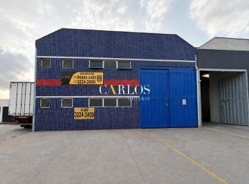 Comercial · 420m² · 3 Vagas · Excelente galpão de esquina com forte visibilidade comercial e amplo estacionamento frontal.