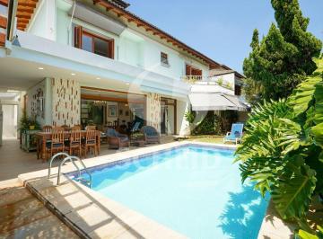 Casa · 446m² · 4 Quartos · 4 Vagas · Casa a venda em condomínio fechado com 4 suítes, 4 vagas, 446m², piscina e churrasqueira!