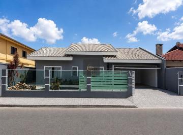 Casa · 212m² · 3 Quartos · 4 Vagas · Casa com 3 quartos, suíte, piscina e energia solar em terreno de 501 m² no Iririú