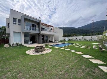 662f08650e6f11d38e5c5fcc287908b6b0074feb · Casa em Condomínio Frente ao Mar em Maresias com 650m² de Terreno, 4 Suítes com Sacada, Piscina e 3 