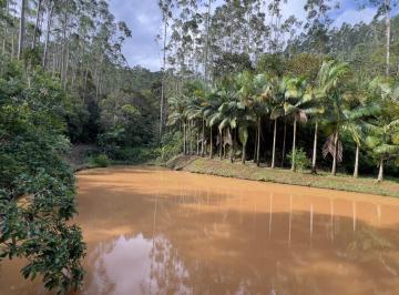 Foto 08 · Terreno com casa, lago e área de plantio a venda em Tijucas