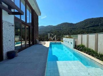 b168b8a3-a44d-4f49-aa85-be3fde01dfe9-17740342465147.jpg · Casa em Condomínio com 4 Suítes – Itacorubi – Florianópolis
