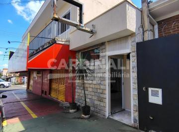 Comercial · 30m² · Sala comercial com cozinha e banheiro em rua comercial.