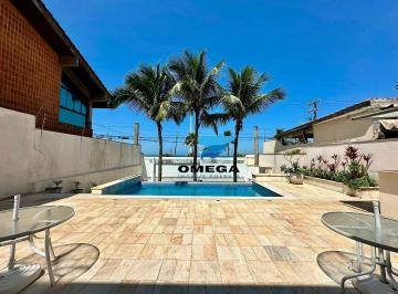 e225fd8e5dc282ca86412f4cead88978a44bce2b · Casa frente mar à venda na Praia da Enseada no Guarujá | Omega Imóveis