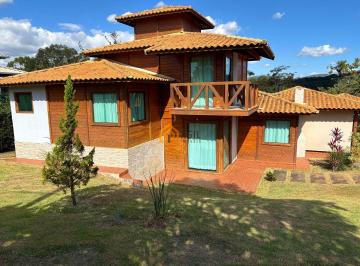 e472c62058952bf176a534bfe52053089a9b9e74 · Casa com 3 dormitórios à venda, 177 m² por R$ 1.099.900,00 - Condomínio Serra Verde - Igarapé/MG